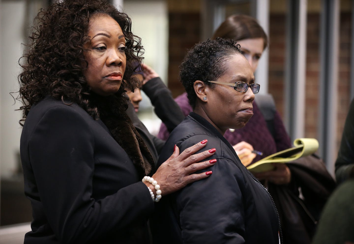 Margaret Brooks, left, consoled Nakia Wilson, first cousin of Philando Castile, after she left the court room where Officer Jeronimo Yanez made his first court appearance at the Ramsey County district court on Friday, Nov. 18, 2016 in St.Paul.