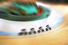 For about five minutes Saturday morning, the U.S. held the world record in women's team pursuit. Kelly Catlin of Arden Hills (In the lead) and teammat