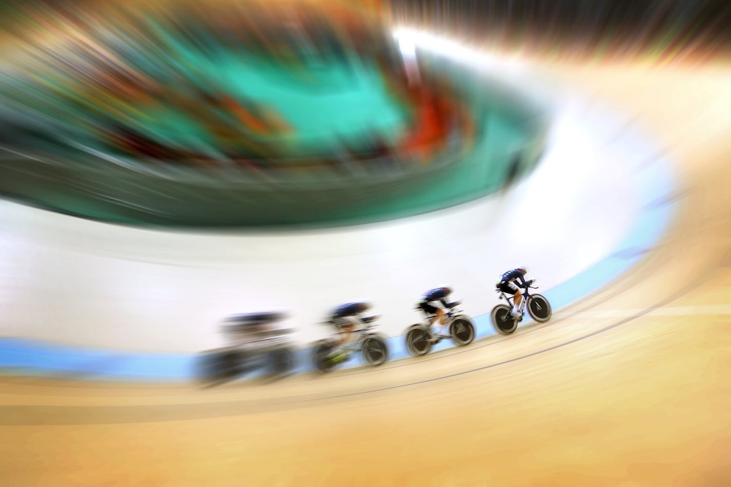 For about five minutes Saturday morning, the U.S. held the world record in women's team pursuit. Kelly Catlin of Arden Hills (In the lead) and teammates Sarah Hammer, Chloe Dygert and Jennifer Valente ripped around the Rio Olympic Velodrome in four minutes, 12.282 seconds, winning their first-round heat as track cycling competition continued at the Rio Games.