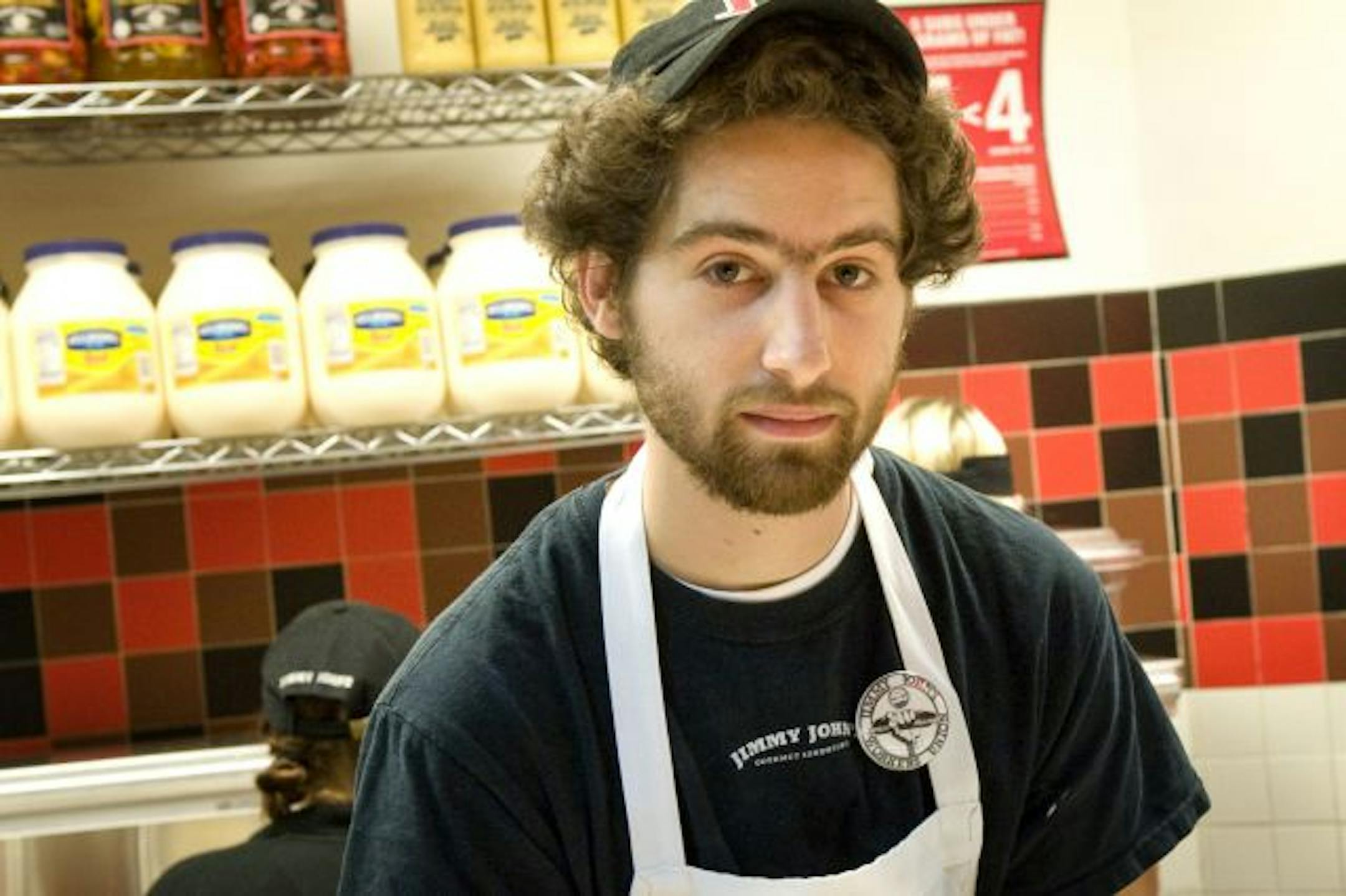 GLEN STUBBE � gstubbe@startribune.com -- Tuesday, October 19, 2010 -- Minneapolis, Minn. -- David Boehnke has been instrumental in organizing the drive to unionize Jimmy John's, works behind the counter at the sandwich shop.