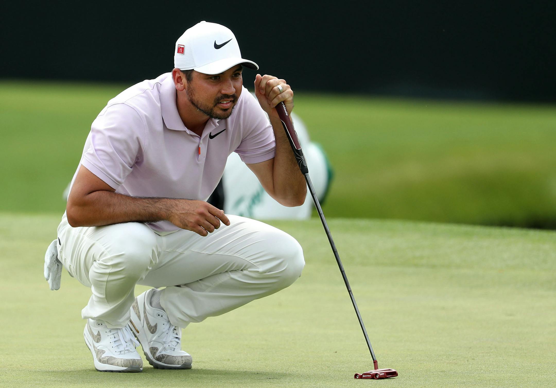 Jason Day lines up his birdie putt on the 15th green during the second round of the Masters Tournament on Friday, April 12, 2019, at Augusta National Golf Club in Augusta, Ga. (Jason Getz/Atlanta Journal-Constitution/TNS) ORG XMIT: 1301399