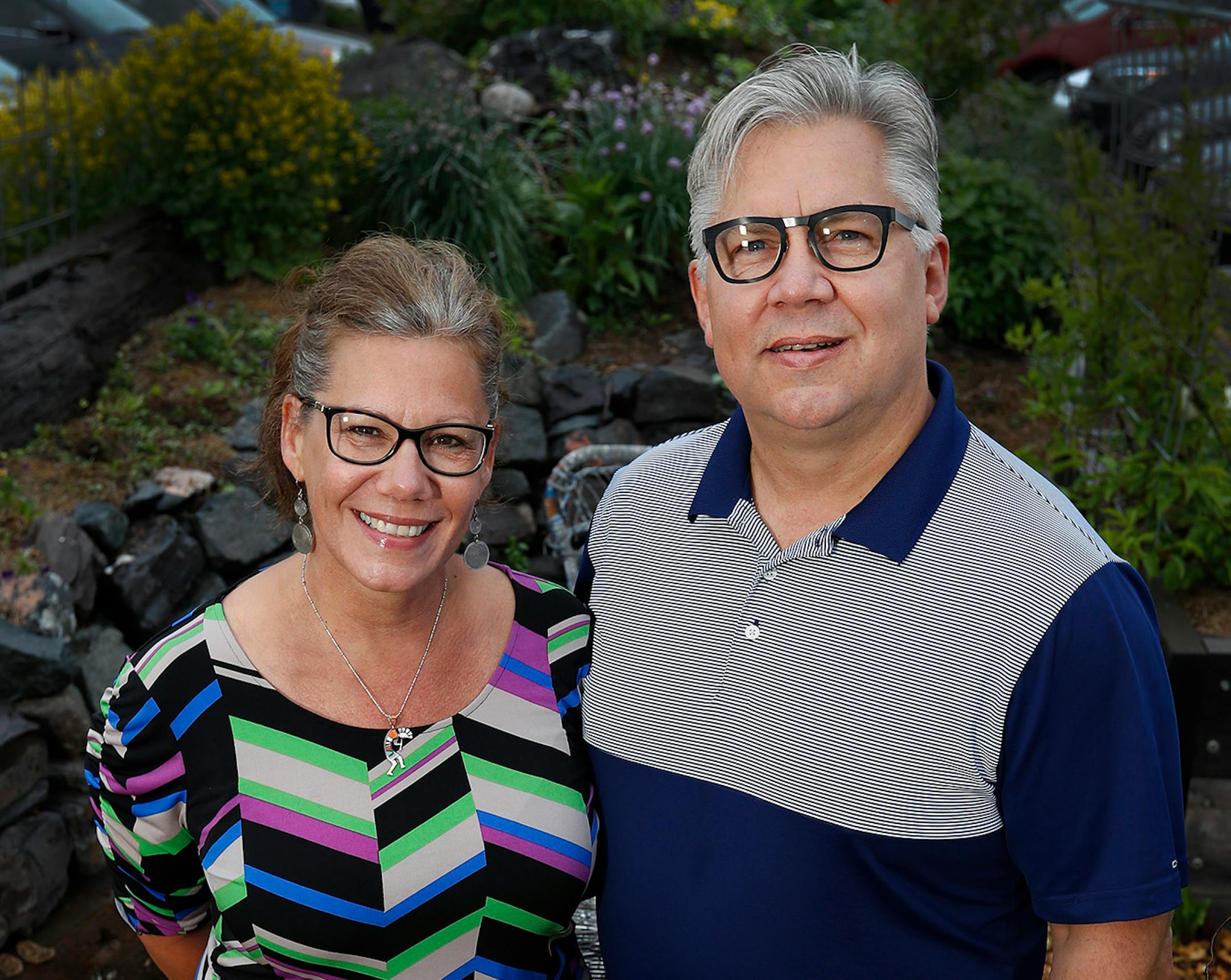 Jaima and Tom Hanson photographed in one of the gardens at their restaurant The Duluth Grill.