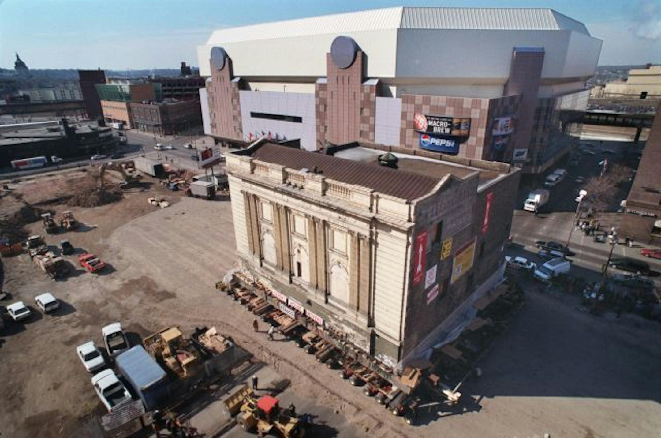 The Shubert Theater, sits on dollies in preparation for the move to its present site on Hennepin Avenue in 1999.