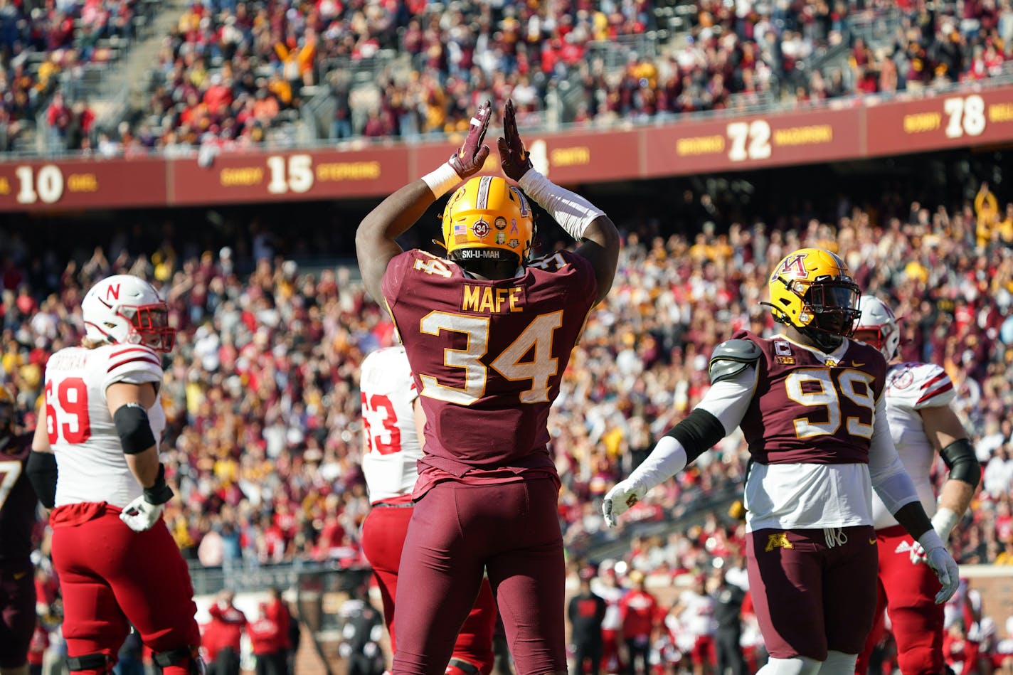 Minnesota Golden Gophers defensive lineman Boye Mafe (34) celebrated after Nebraska Cornhuskers were called for a safety in the fourth quarter.