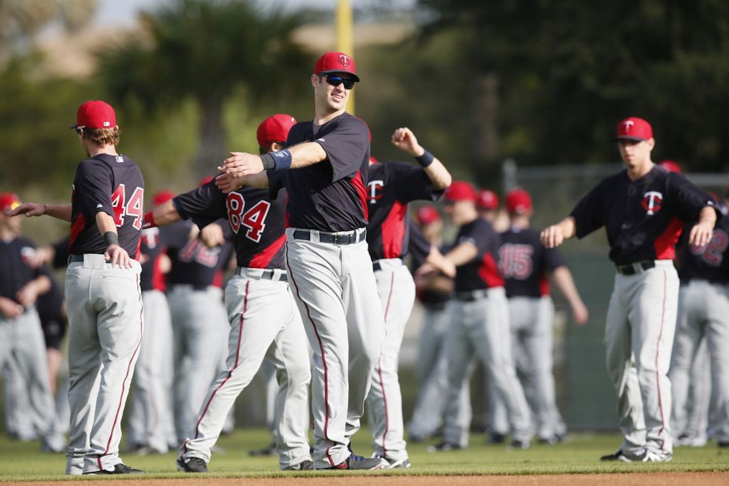 Minnesota Twins catcher Joe Mauer and teammates stretched out on their first day of full team workouts Wednesday Feb.13, 2013 at Lee County Sports Complex in Fort Myers, FL.