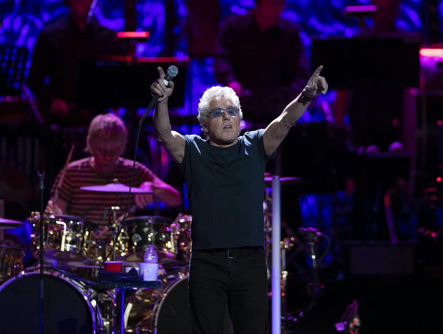 Lead singer Roger Daltrey at the beginning of Amazing Journey early in The Who's show at Xcel Friday night. ] JEFF WHEELER &#x2022; jeff.wheeler@startribune.com The Who were joined by an orchestra for their Moving On! tour stop at Xcel Energy Center in St. Paul Friday night, September 6, 2019.