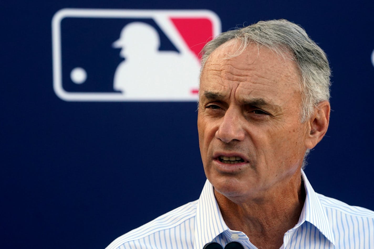 Major League Baseball Commissioner Rob Manfred speaks during a news conference after negotiations with the players' association toward a labor deal, Tuesday, March 1, 2022, at Roger Dean Stadium in Jupiter, Fla. Manfred said he is canceling the first two series of the season that was set to begin March 31, dropping the schedule from 162 games to likely 156 games at most. Manfred said the league and union have not made plans for future negotiations. Players won't be paid for missed games. (AP Photo/Wilfredo Lee)