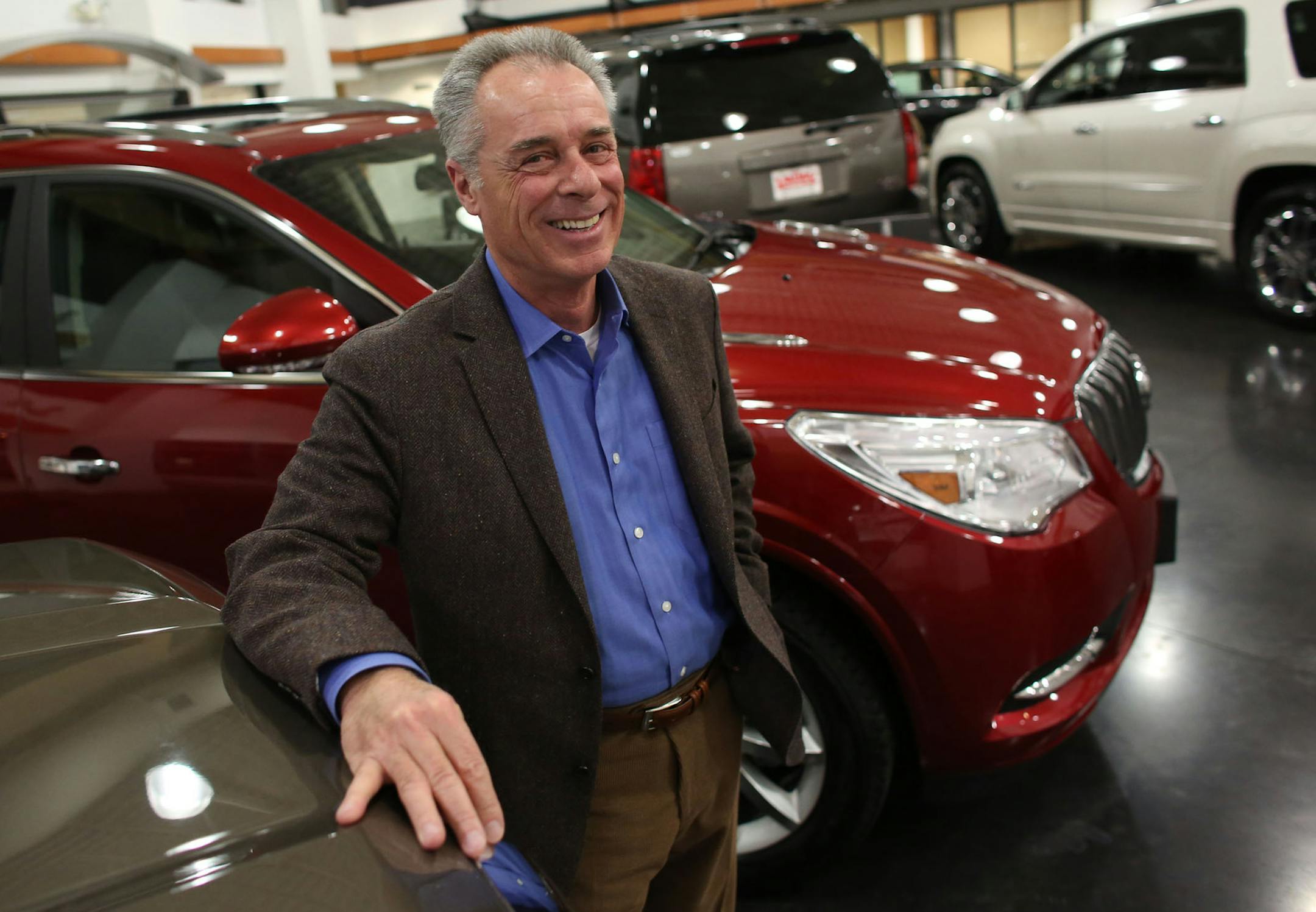 Jim Paul Valley Buick GMC stood on the showroom floor of his dealership in Apple Valley, Tuesday, December 3, 2013. ] (KYNDELL HARKNESS/STAR TRIBUNE) kyndell.harkness@startribune.com