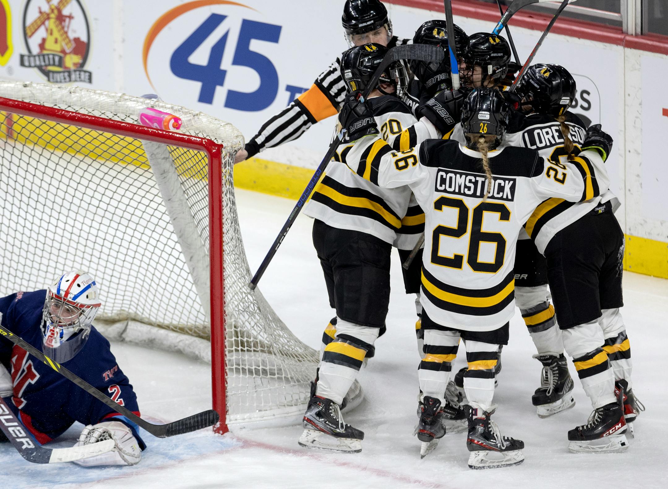 Warroad celebrates a goal by Maddie Skogman (2) in the second period during the Class 1A quarterfinals.
