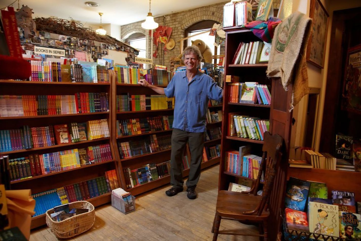 MINNEAPOLIS, MN- June 30: Wild Rumpus Bookstore owner Tom Braun and family on location in the Linden Hills neighborhood in Minneapolis, MN on Wednesday, June 30, 2010.