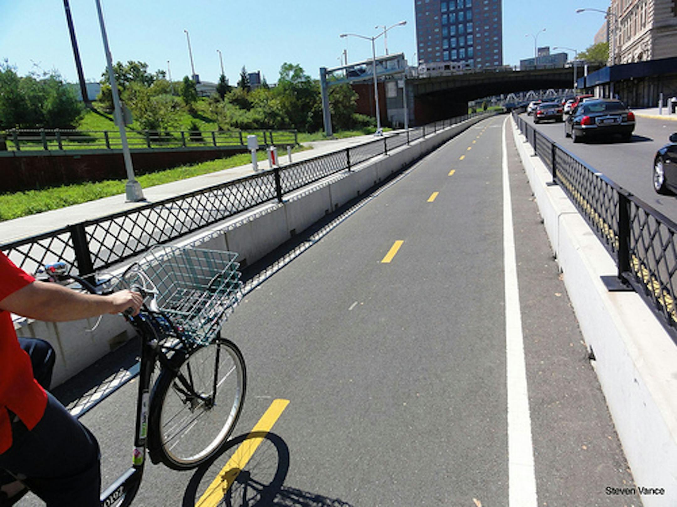 Photo of Chicago protected bike lane. Photo from Steven Can Plan