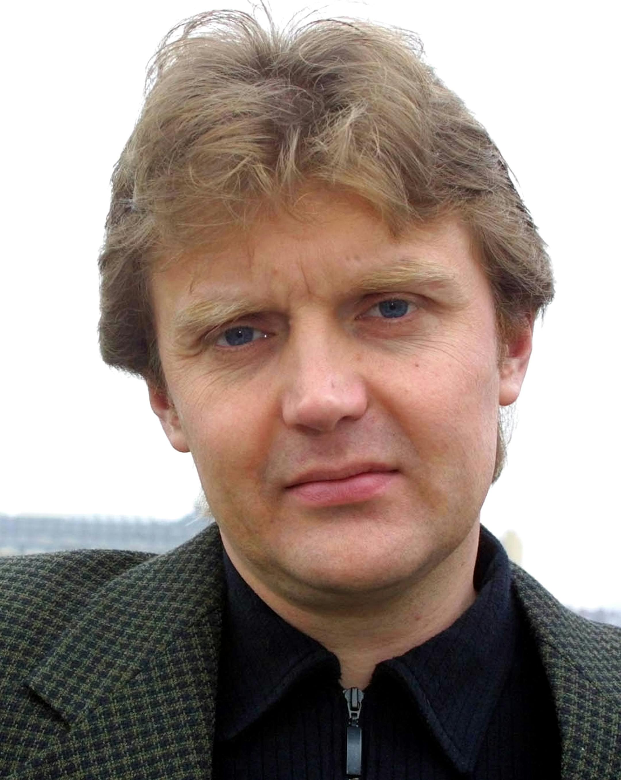 Alexander Litvinenko, former KGB spy and author of the book "Blowing Up Russia: Terror From Within", photographed at his home in London.
