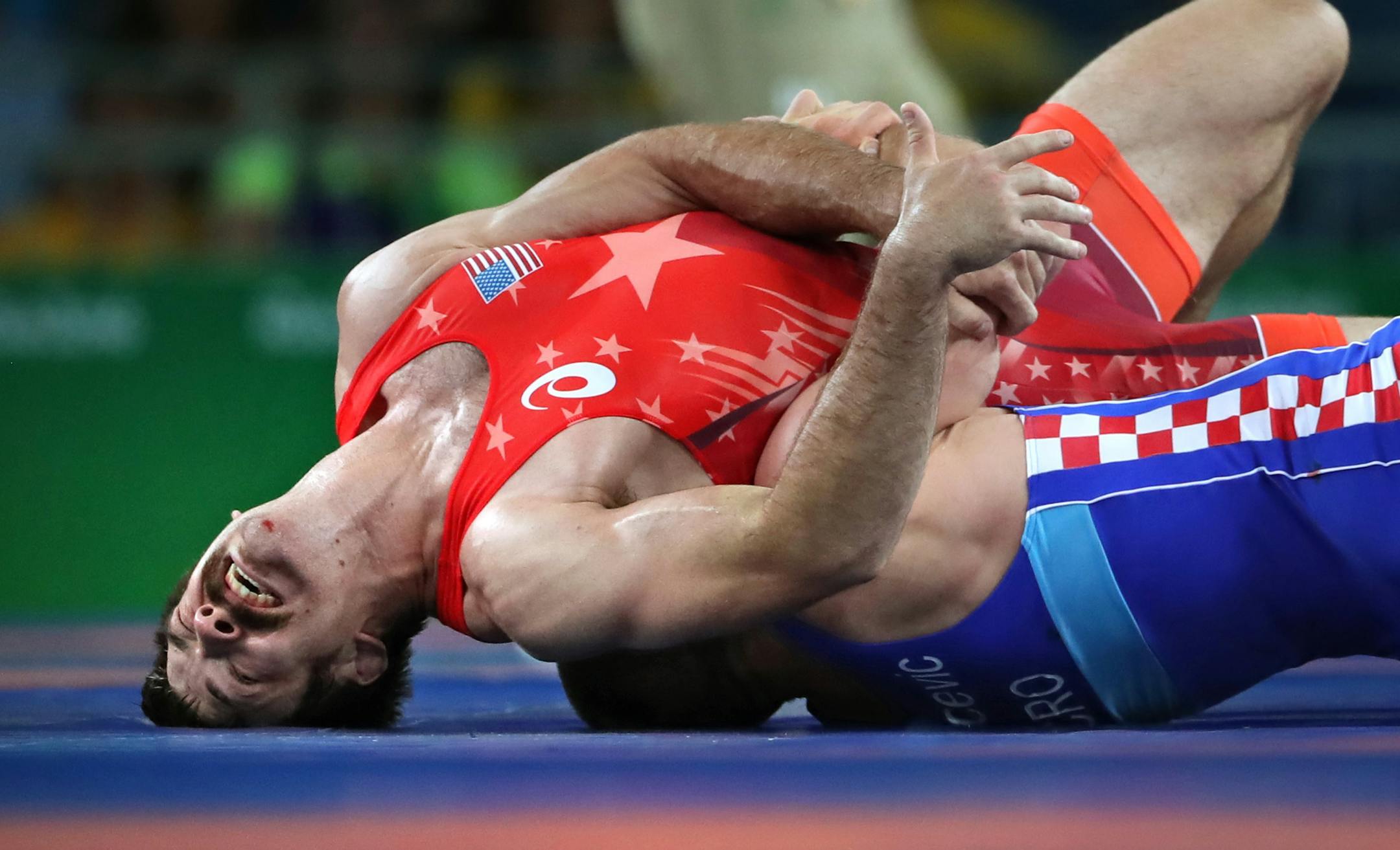 Andy Bisek of Chaska (in red) eked out a 1-0 victory over Yurisandy Hernandez Rios of Cuba in his opener of the 75-kilogram (165 pounds) weight class. One mistake doomed him in the quarterfinals, as he lost 2-0 to Croatia's Bozo Starcevic. To get into the repechage — and keep wrestling toward a bronze medal — he needed Starcevic to upset defending Olympic champion Roman Vlasov of Russia in the semifinals. It was even harder to take when Starcevic lost a controversial, chaotic match at Carioca Ar