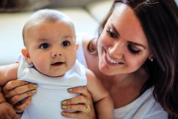 Caitlin Singh, a first-time mom from Minneapolis, with her baby, Ganeev.