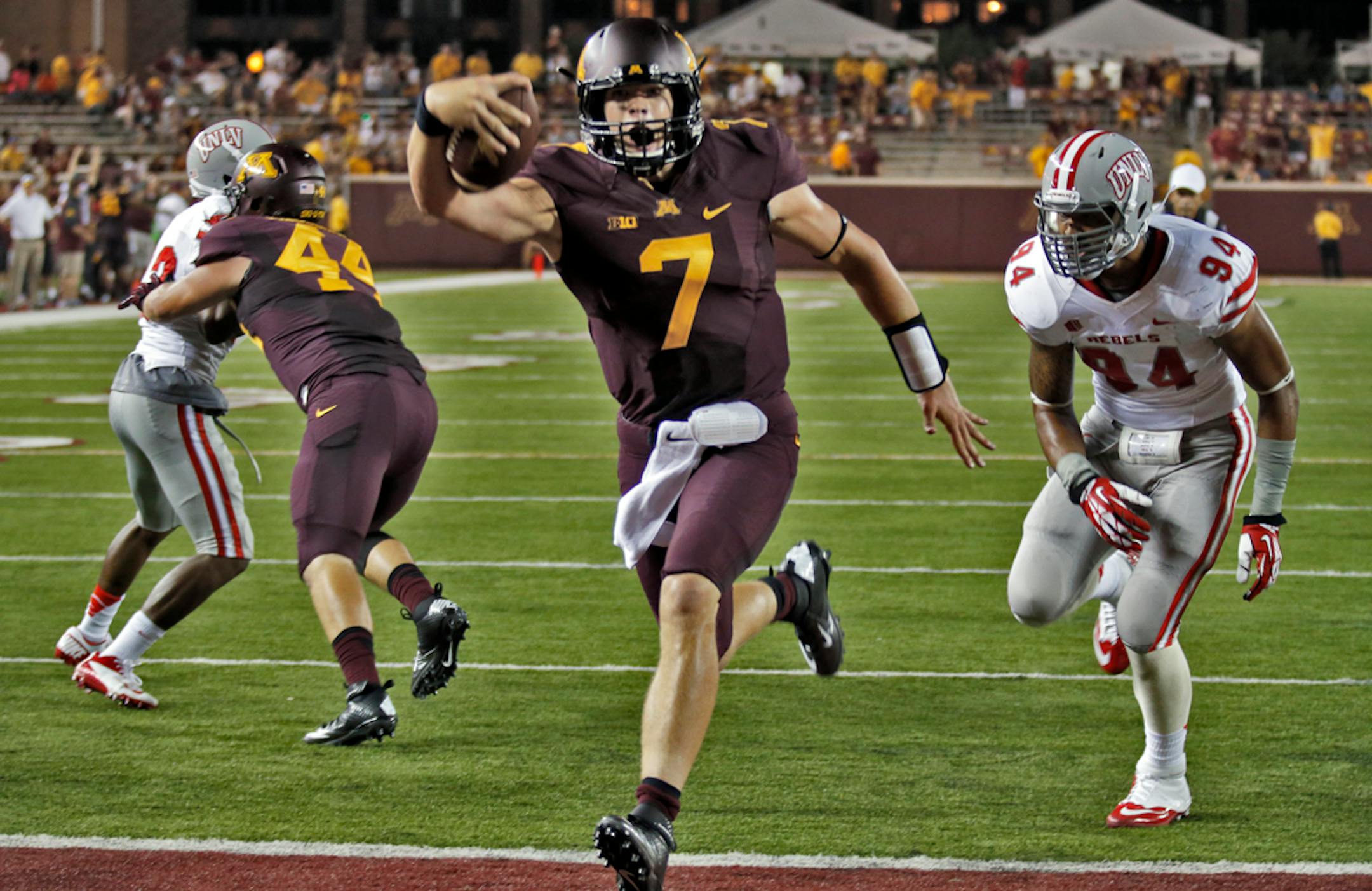 Minnesota Gophers vs. UNLV. Minnesota won 51-23. Minnesota backup quarterback Mitch Leidner celebrated as he rambled in for a touchdown late in the game.