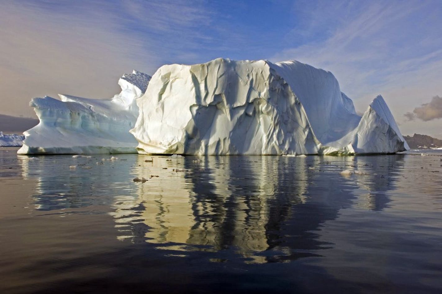 A sculptured iceberg in North Bay, Rothera Point, Adelaide Island, Antarctica. Shrinking sea ice is significantly increasing the rate at which icebergs scour the Antarctic seabed.