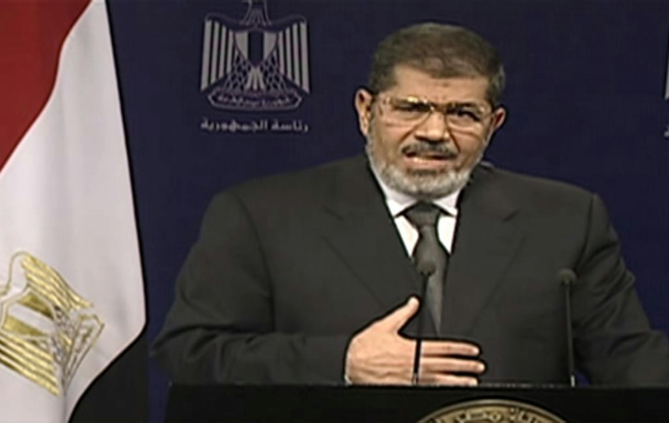 This image made from video broadcast on Egyptian State Television shows President Mohammed Morsi addressing the nation in a televised speech on Tuesday, July 2, 2013.
