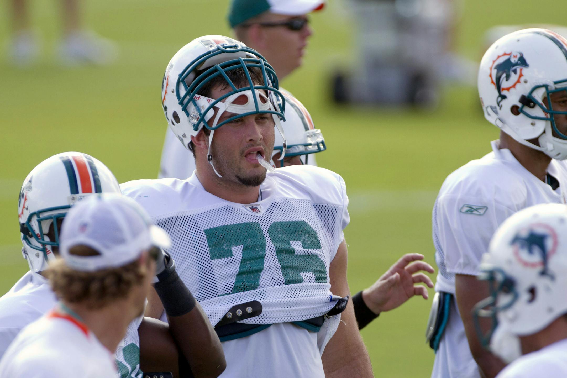 Miami Dolphins player Lydon Murtha (76) runs drills during the NFL football camp in Davie, Fla. Monday, Aug. 2, 2010. (AP Photo/J Pat Carter) ORG XMIT: NYOTK