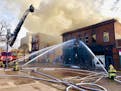 Duluth firefighters worked to quell flames in a three-story building downtown Saturday, Nov. 21.