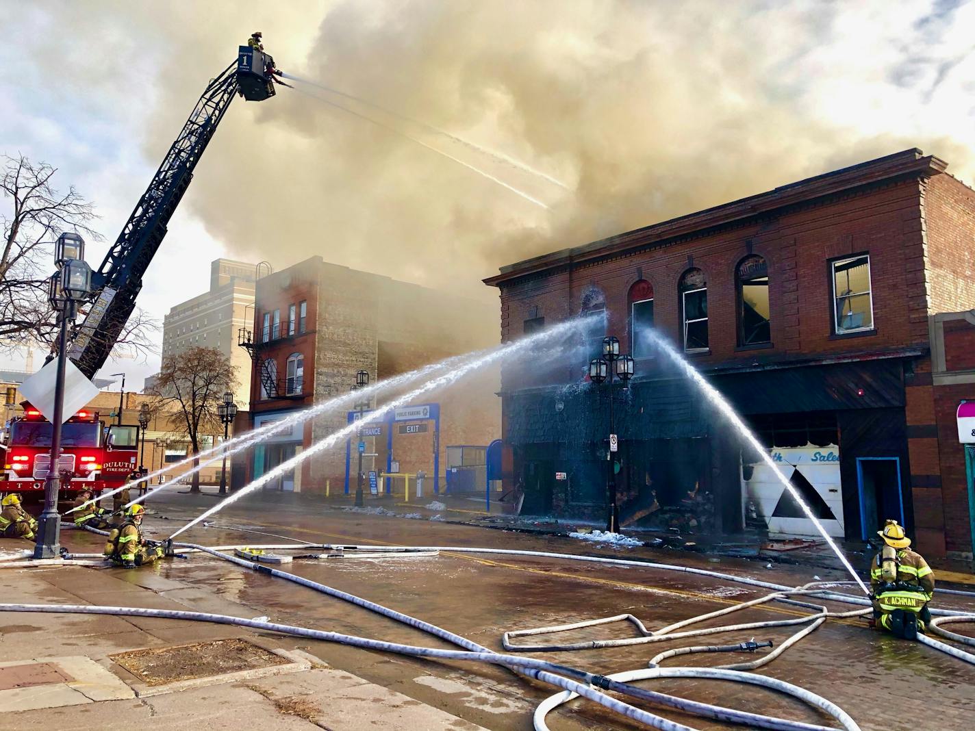 Duluth firefighters worked to quell flames in a three-story building downtown Saturday, Nov. 21.