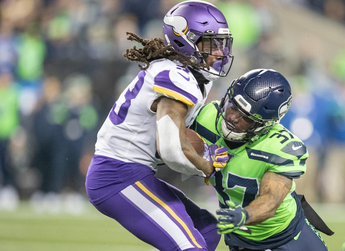 Vikings running back Dalvin Cook was tackled by Seahawks defensive back Quandre Diggs during the second quarter.