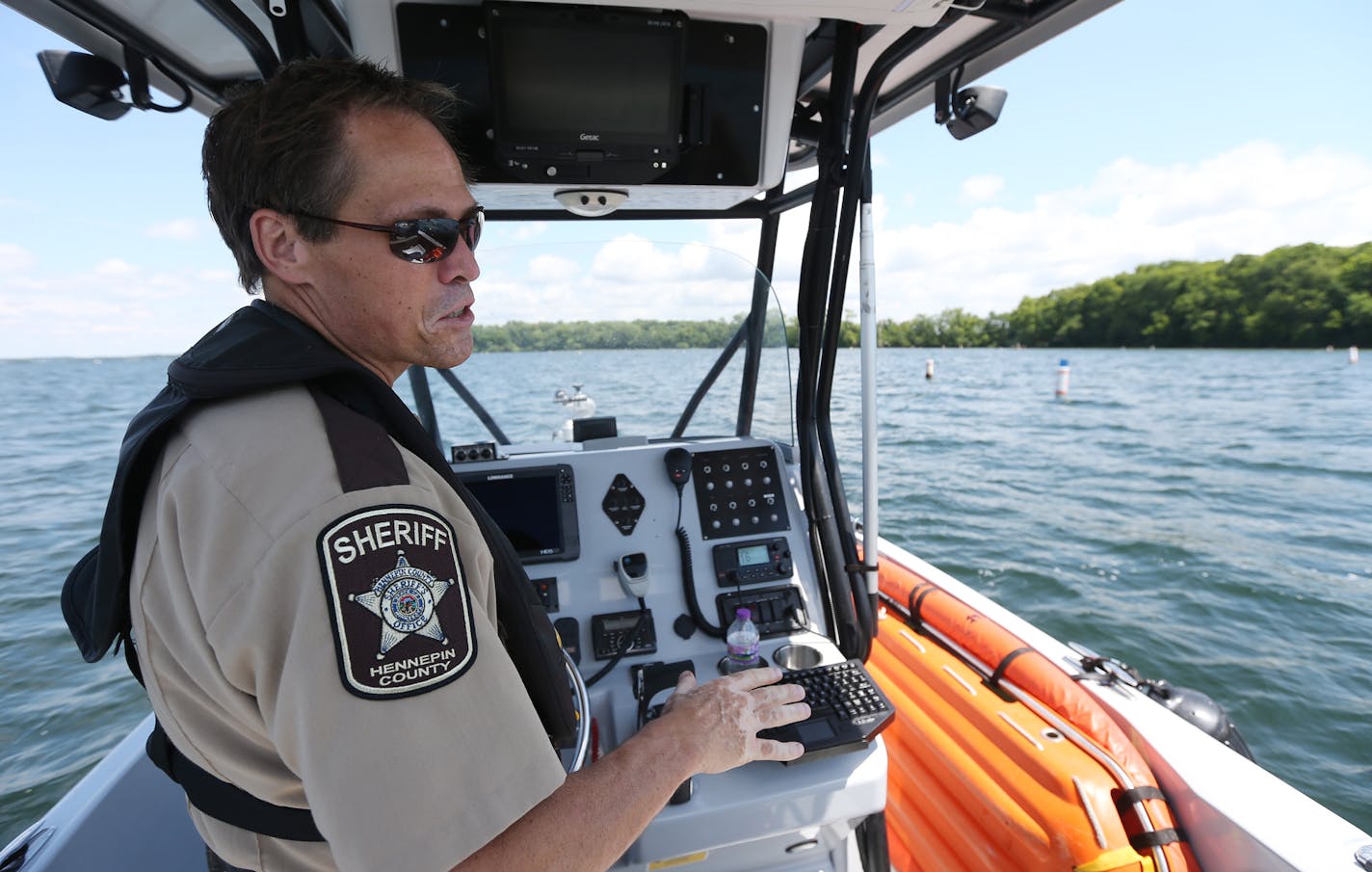 Lieutenant Kent M. Vnuk of the Hennepin Country Sheriff Water Patrol Unit looked over Lake Minnetonka Wednesday as his unit prepared for the up coming holiday June 30, 2016 in Spring Park , MN.] Jerry Holt /Jerry.Holt@Startribune.com