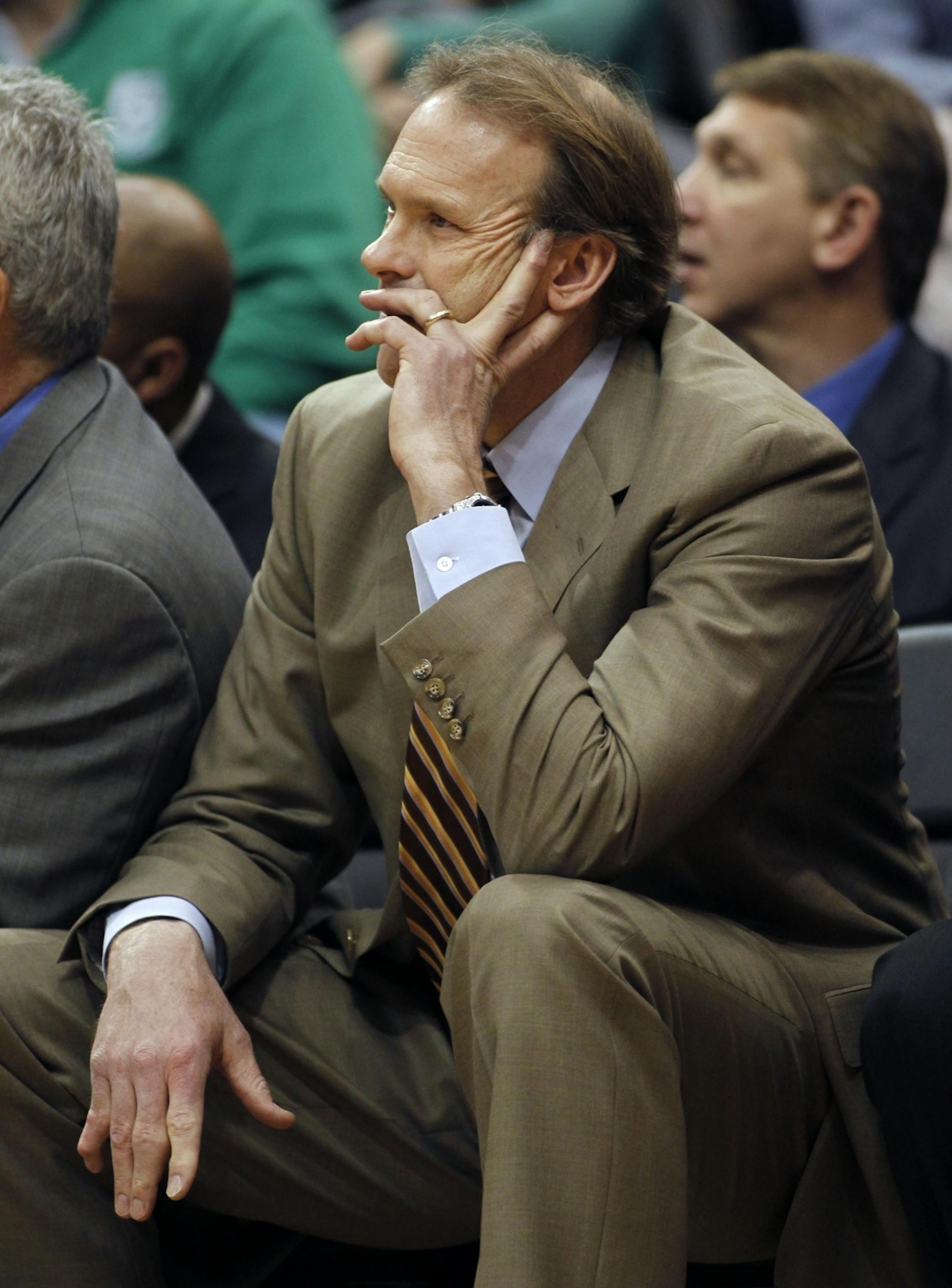 At the Target Center in a game between the Timberwolves and the Mavericks, Kurt Rambis contemplates during the waning minutes of the game.