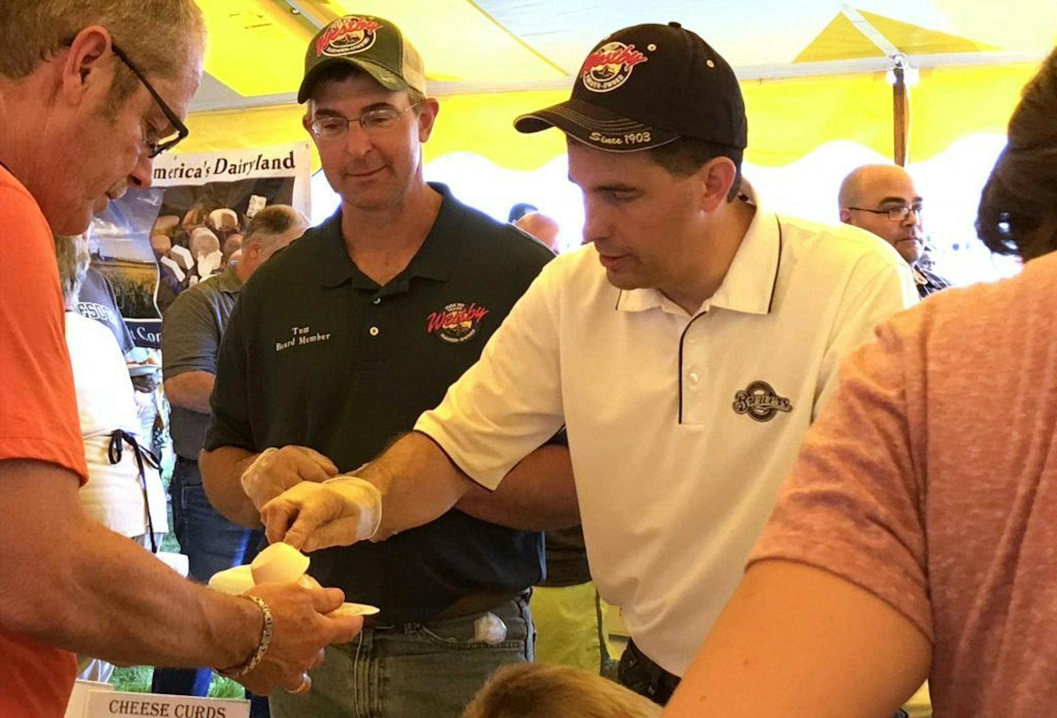 Wisconsin Gov. Scott Walker doles out cheese curds.