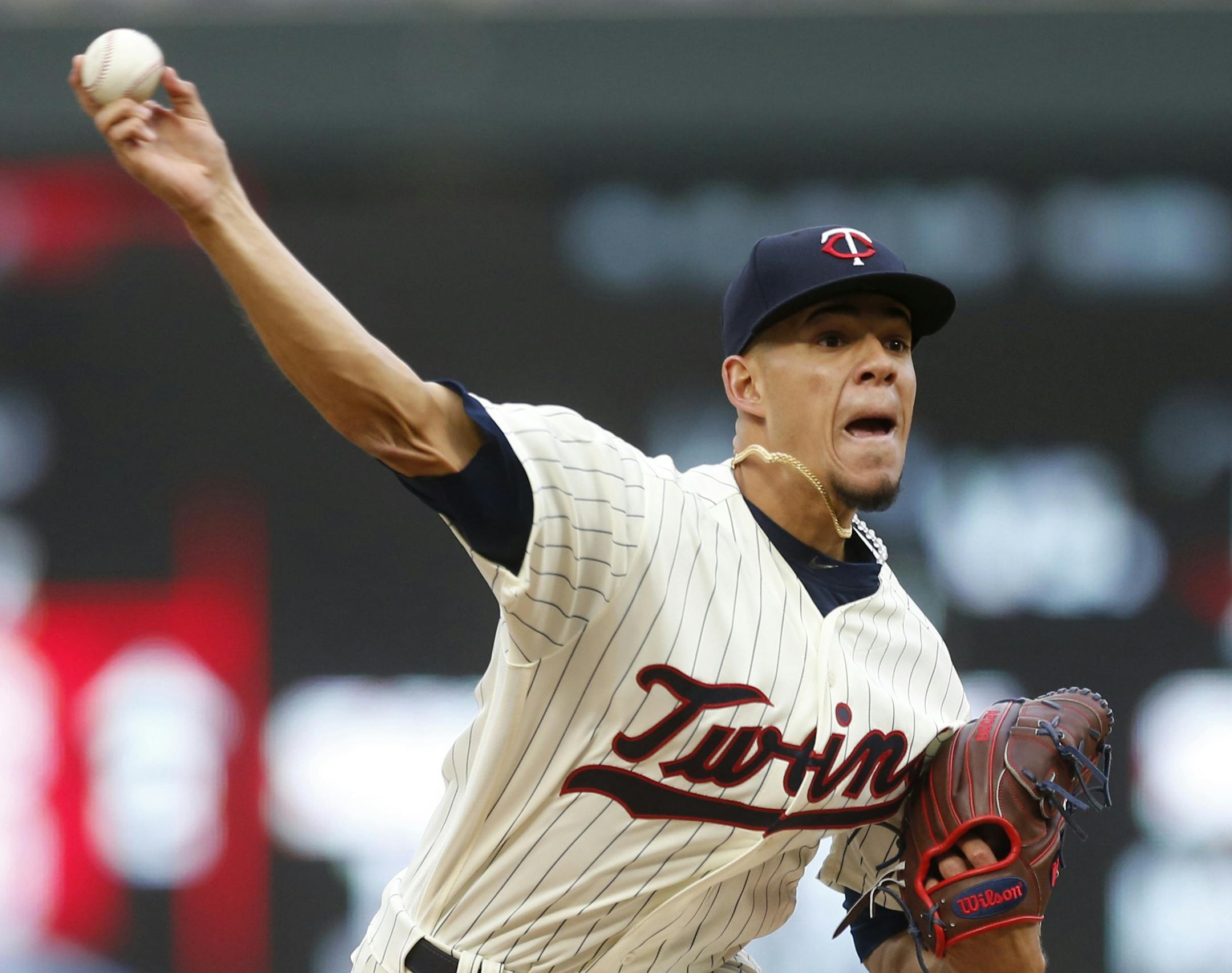 Minnesota Twins pitcher Jose Berrios throws against the Colorado Rockies during the third inning of the second game of a baseball doubleheader Thursday, May 18, 2017, in Minneapolis. (AP Photo/Jim Mone)