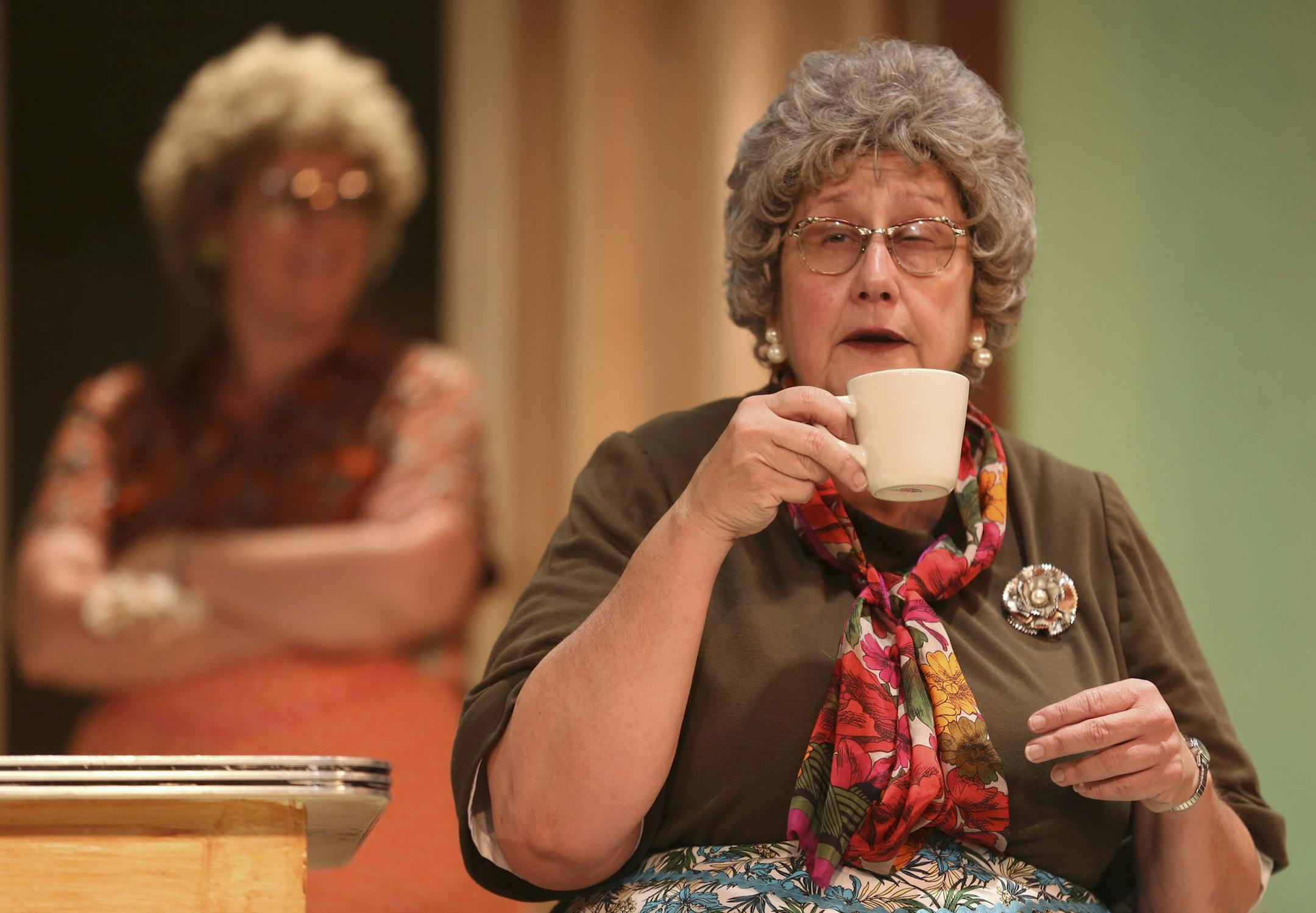 Actress Janet Paone, playing Mrs. Lars Snustad sipped her cup of egg coffee during dress rehearsal of the "Church Basement Ladies," at Plymouth Playhouse in Plymouth, Min., Tuesday, July 30, 2013. ] (KYNDELL HARKNESS/STAR TRIBUNE) kyndell.harkness@startribune.com