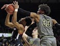 Baylor's Freddie Gillespie (33) blocks a shot by Texas Tech's Terrence Shannon Jr. (1) during the second half of an NCAA college basketball game in Wa