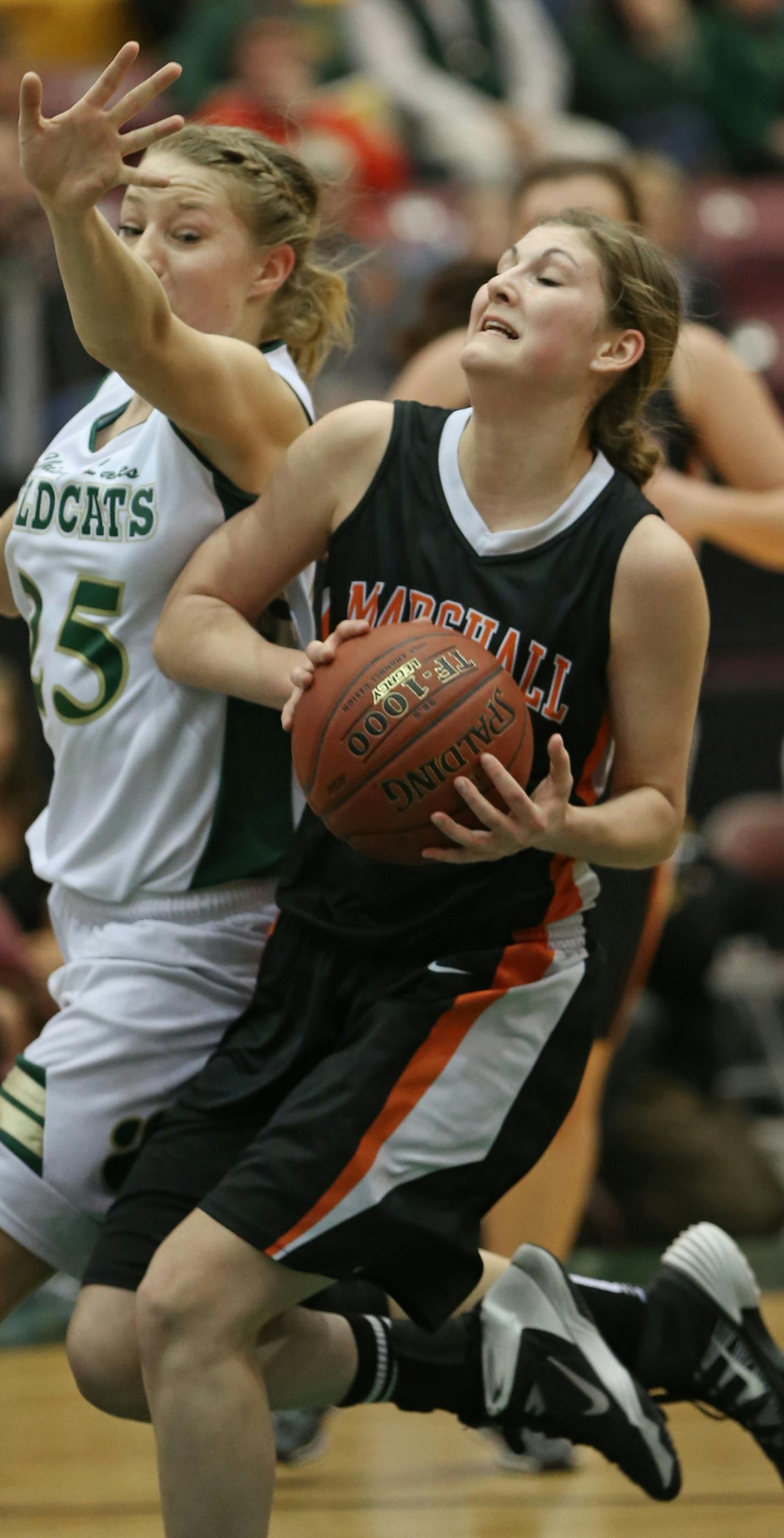 (left to right) Chisago Lakes Sarah Greene defended as Marshall's Lexi Saugstad drove to the basket.] Girls Basketball Tournament, 3/19/14, Mariucci Arena, Class 3A Marshall vs. Chisago Lakes Area Lindstrom Bruce Bisping/Star Tribune bbisping@startribune.com Sarah Greene, Lexi Saugstad/roster