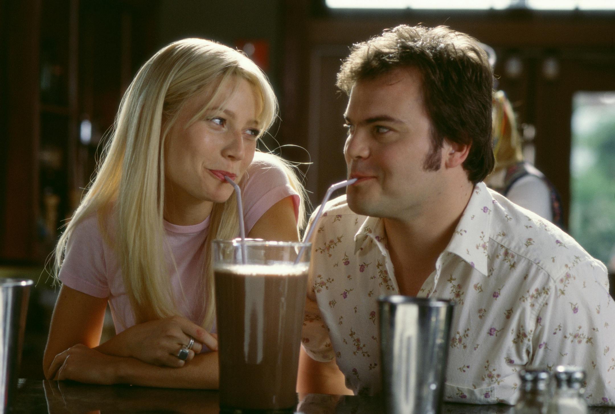 Rosemary (Gwyneth Paltrow) and Hal (Jack Black) share a tender moment over an enormous chocolate shake in “Shallow Hal.”