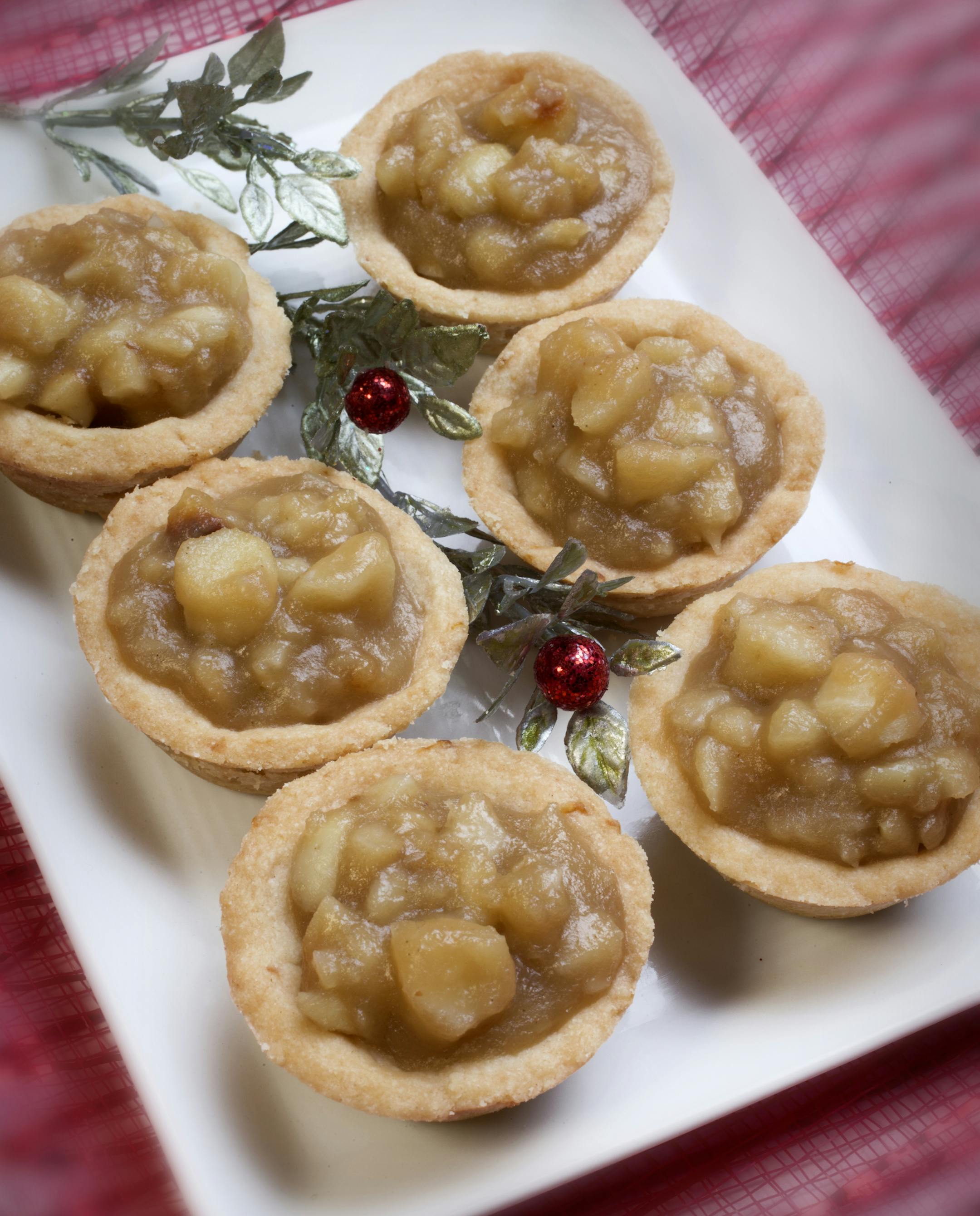 Caption for cookies: The 2014 Taste holiday cookie contest winners include: Italian Almond Cookies, Tart & Sassy Cranberry Lemon Drops; Chocolate Thumbprints; Macadamia Nut Tarts and Espresso-Hazelnut Truffle Cookies. The annual Star Tribune cooky contest