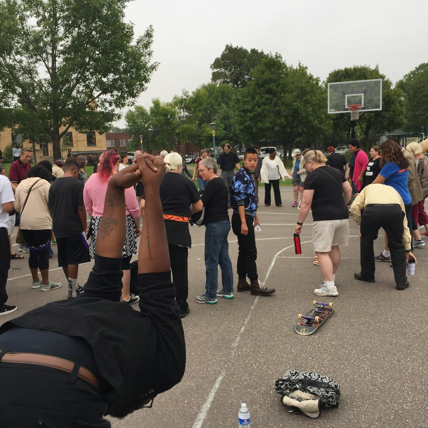 One of the group's organizers, Michael McDowell, stretches before the start of the Black Lives Matter march Saturday in St. Paul