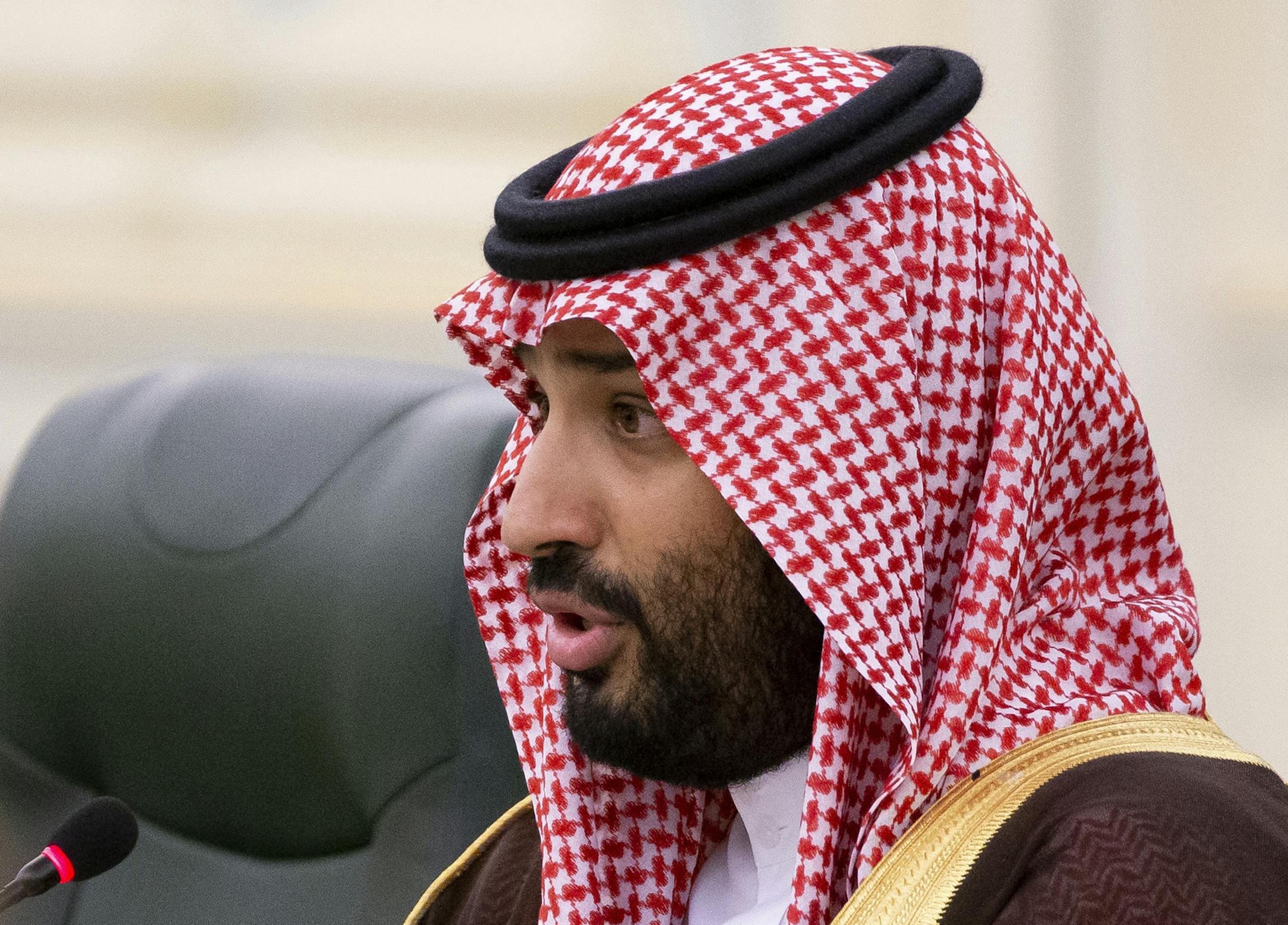 FILE - In this Oct. 14, 2019 file photo, Saudi Arabia's Crown Prince Mohammed bin Salman speaks to Russian President Vladimir Putin during the talks in Riyadh, Saudi Arabia. Saudi Crown Prince Mohammed bin Salman is in the United Arab Emirates for talks that are expected to focus on the war in Yemen and tensions with Iran. The UAE’s state-run WAM news agency reported the 34-year-old Saudi prince was greeted upon arrival Wednesday, Nov. 27, by Abu Dhabi Crown Prince Mohammed bin Zayed Al N