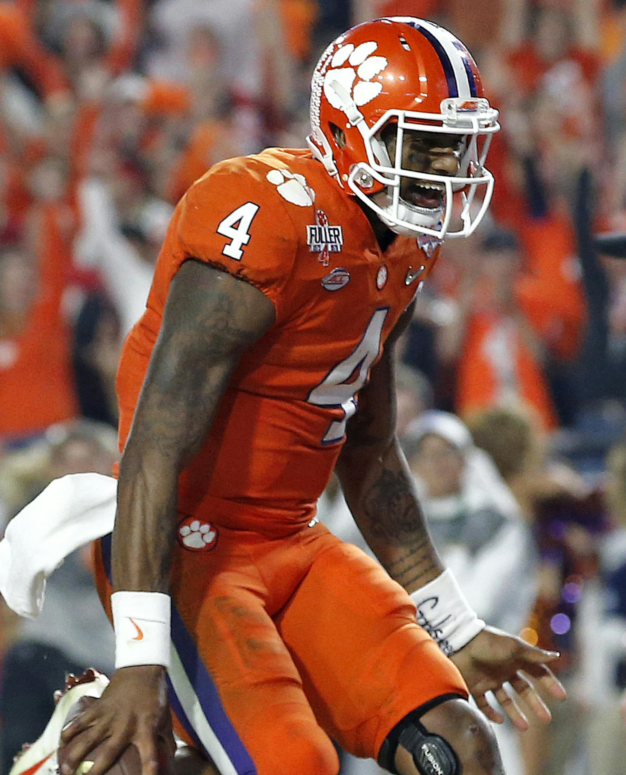 Clemson quarterback Deshaun Watson (4) celebrates his touchdown against Ohio State during the second half of the Fiesta Bowl NCAA college football playoff semifinal, Saturday, Dec. 31, 2016, in Glendale, Ariz. (AP Photo/Ross D. Franklin)