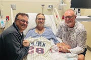 Jamie Green with his brother, John, left, and Twins great Bert Blyleven, right, in the hospital after suffering a heart attack during a Twins fantasy 
