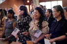 Women representing more than 20 countries take part in a Naturalization Ceremony, March 8, 2024, in San Antonio. More than half of the foreign-born po