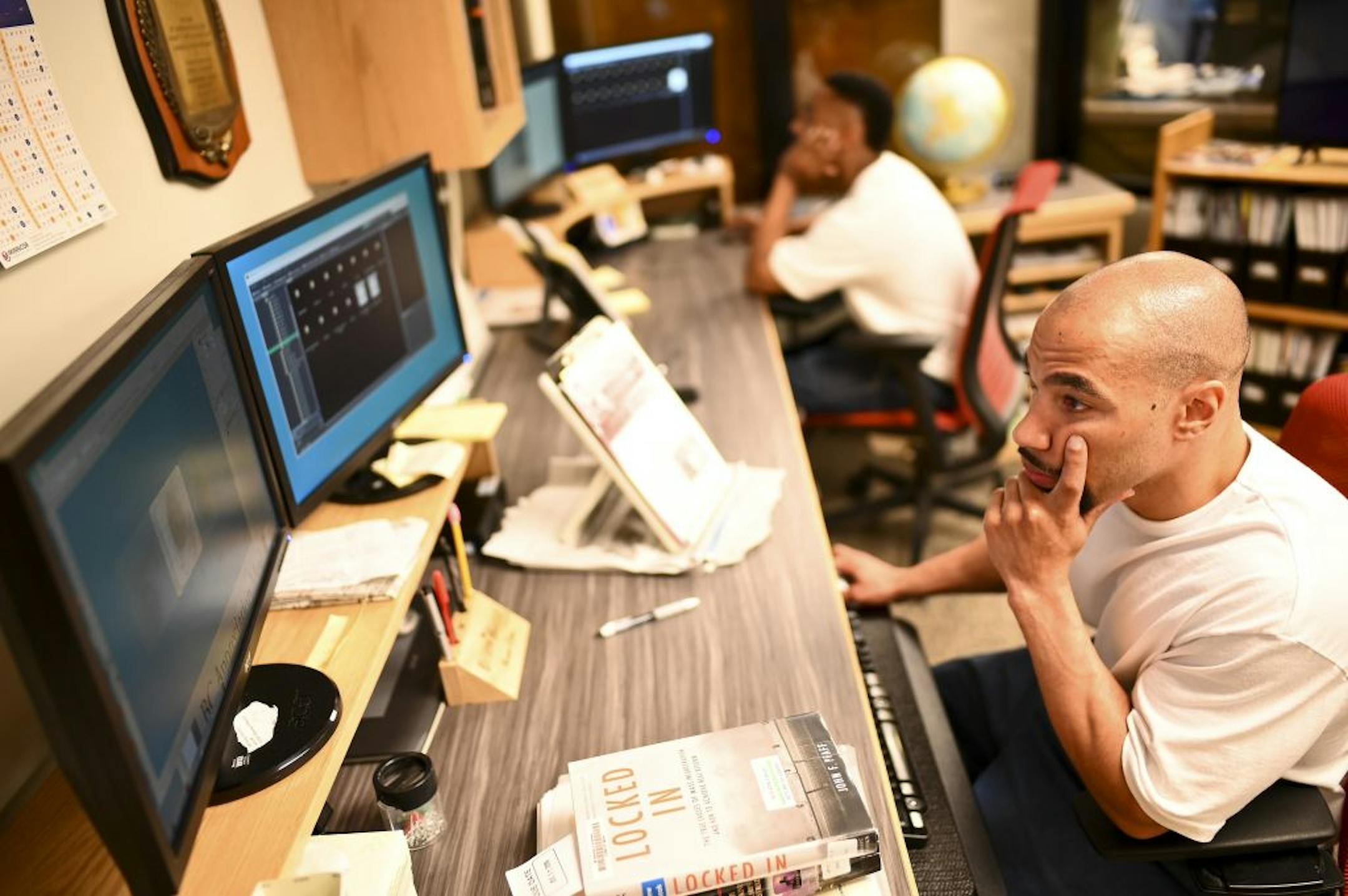 Jeffery Young, an inmate at Stillwater Correctional Facility and editor for the Prison Mirror, worked on producing an edition of the Mirror Wednesday. He was working on an article about the color of water at the prison.