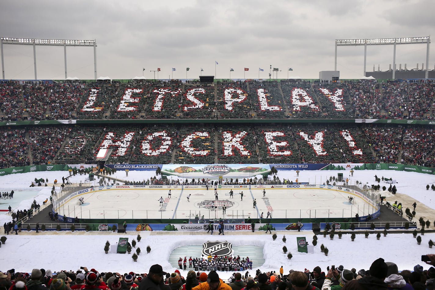 Players waited for the puck to drop and play to begin between the Wild and the Blackhawks Sunday afternoon. ] JEFF WHEELER &#xef; jeff.wheeler@startribune.com The Minnesota Wild met the Chicago Blackhawks in the 2016 NHL Stadium Series outdoor game Sunday afternoon, February 21, 2016 at TCF Bank Stadium in Minneapolis. ORG XMIT: MIN1602211538291108