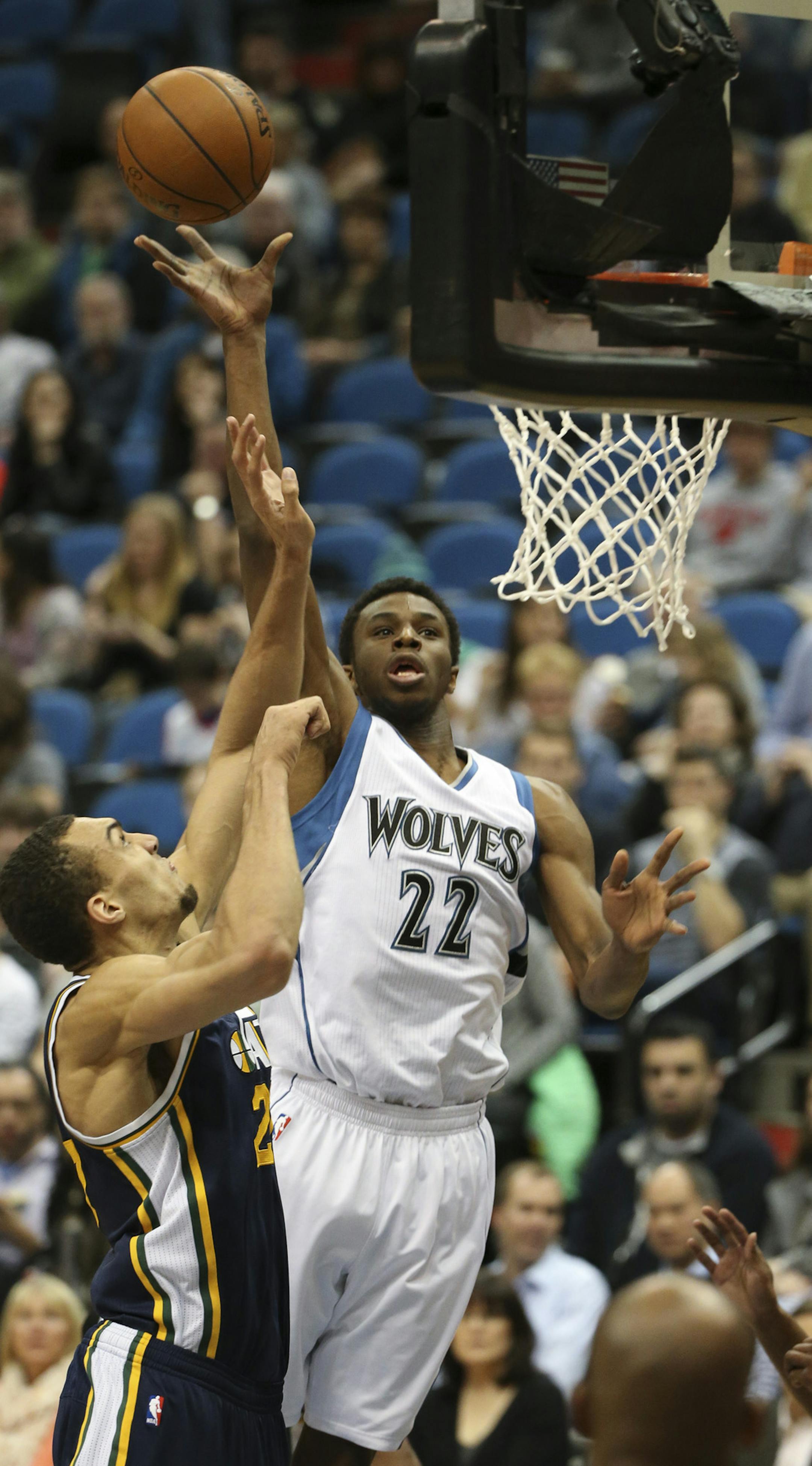 Minnesota Timberwolves forward Andrew Wiggins took a first quarter shot over Utah Jazz center Rudy Gobert Monday night at Target Center. ] JEFF WHEELER &#xef; jeff.wheeler@startribune.com The Minnesota Timberwolves faced the Utah Jazz Monday night, March 30, 2015 at Target Center in Minneapolis.