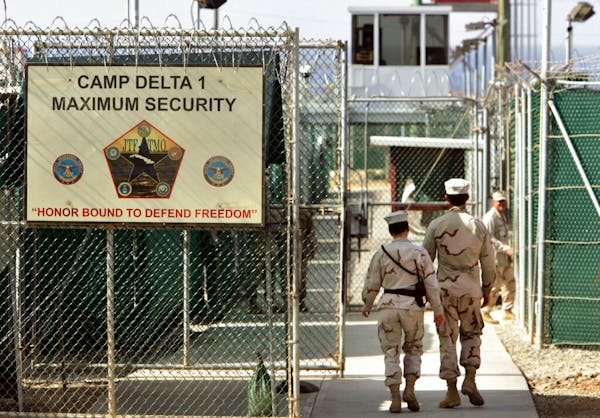 U.S. military guards at Camp Delta military-run prison, at the Guantanamo Bay U.S. Naval Base, Cuba, in June 2006.