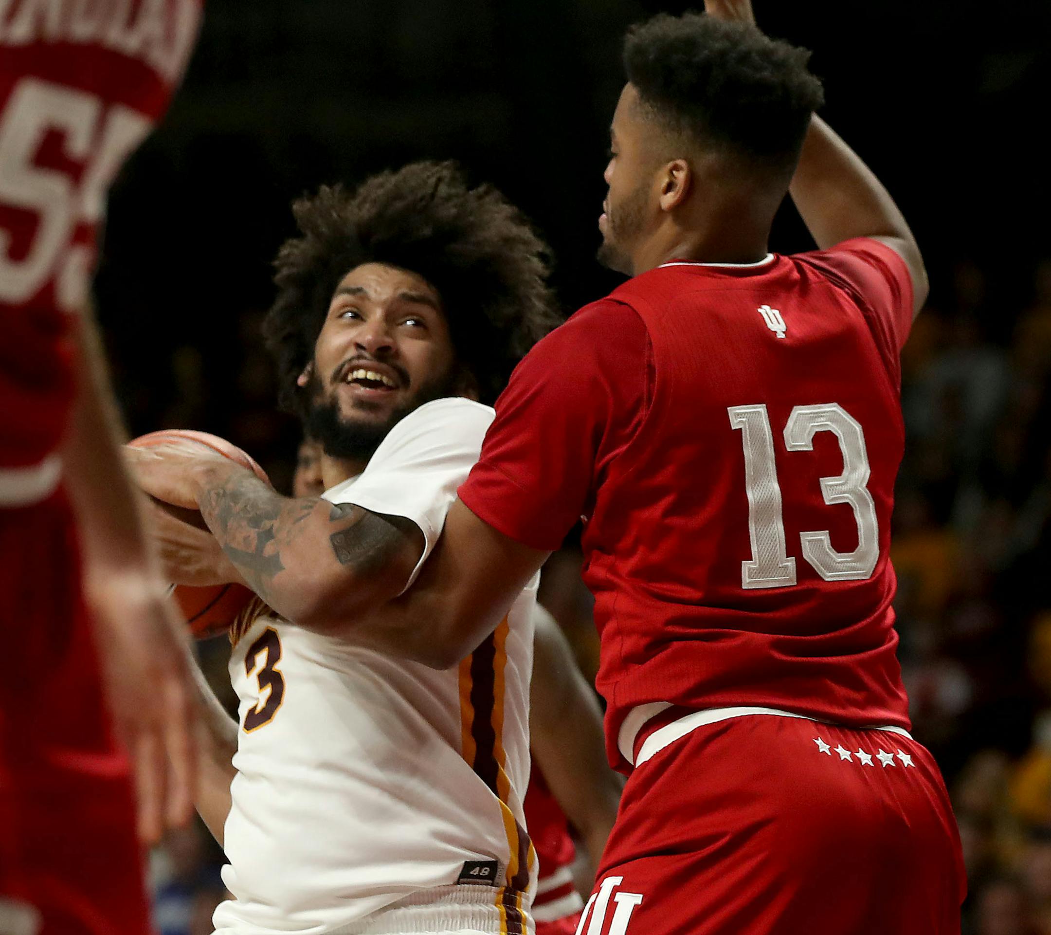 Minnesota's Jordan Murphy (3) drives against Indiana's Juwan Morgan (13) during the first half on Saturday, Feb. 16, 2019, at Willams Arena in Minneapolis. The host Golden Gophers won, 84-63. (David Joles/Minneapolis Star Tribune/TNS)