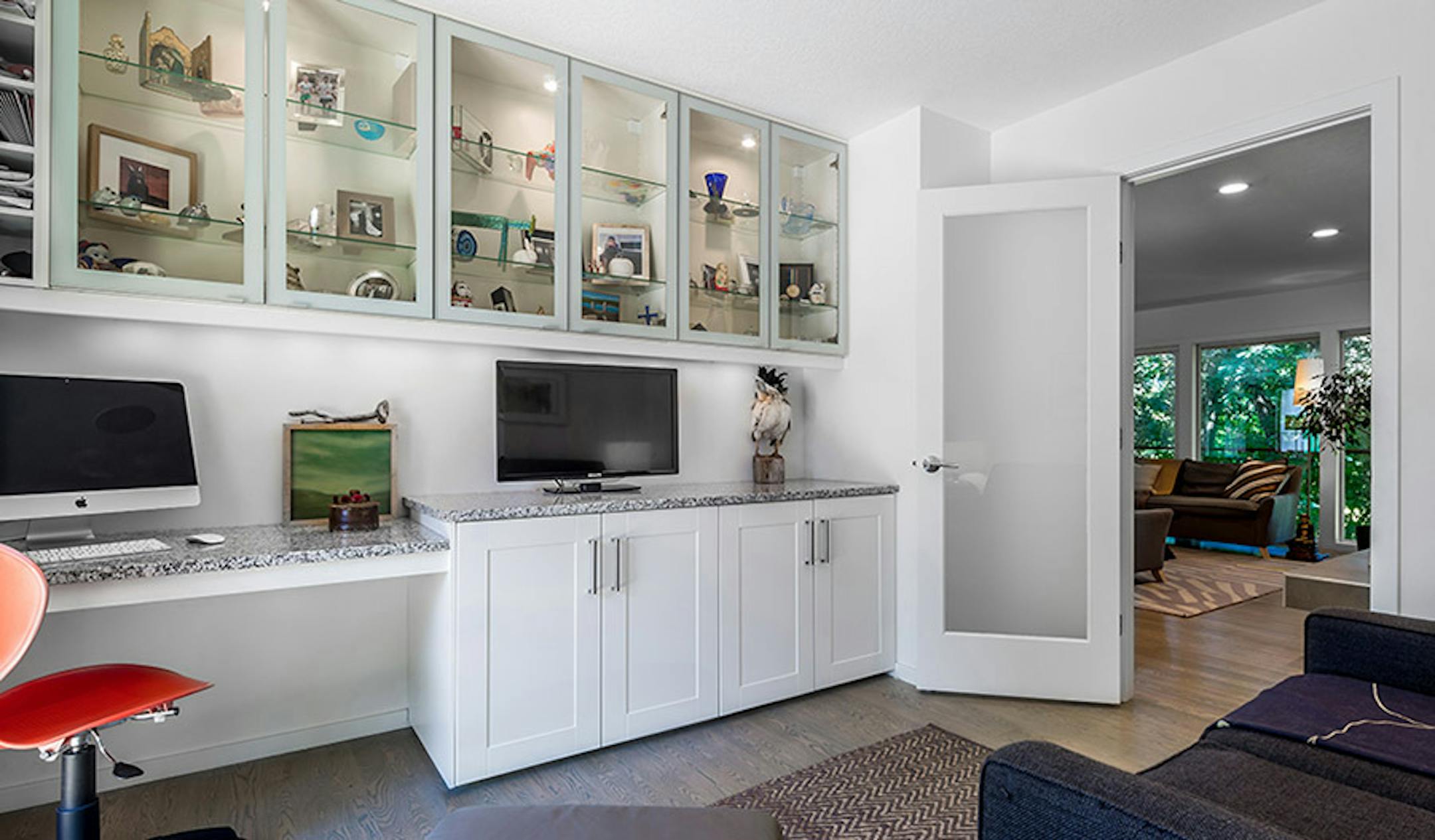 A bedroom was converted into a home office/den.