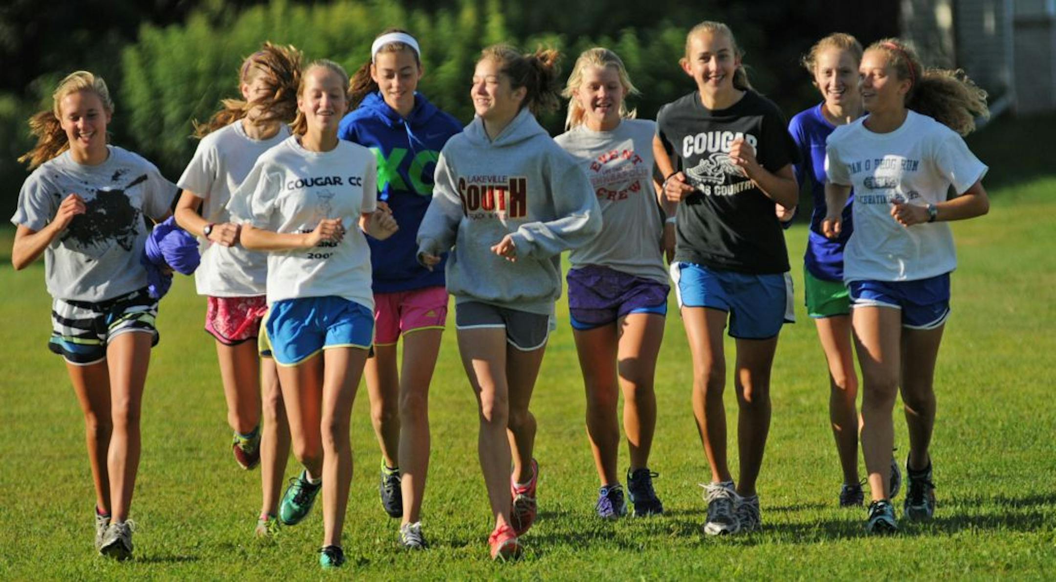 Junior captain Erin Kilbride, third from left, and members of the top-ranked Lakeville South girls' cross-country team worked out last week. Photo by Richard Sennott • rsennott@startribune.com