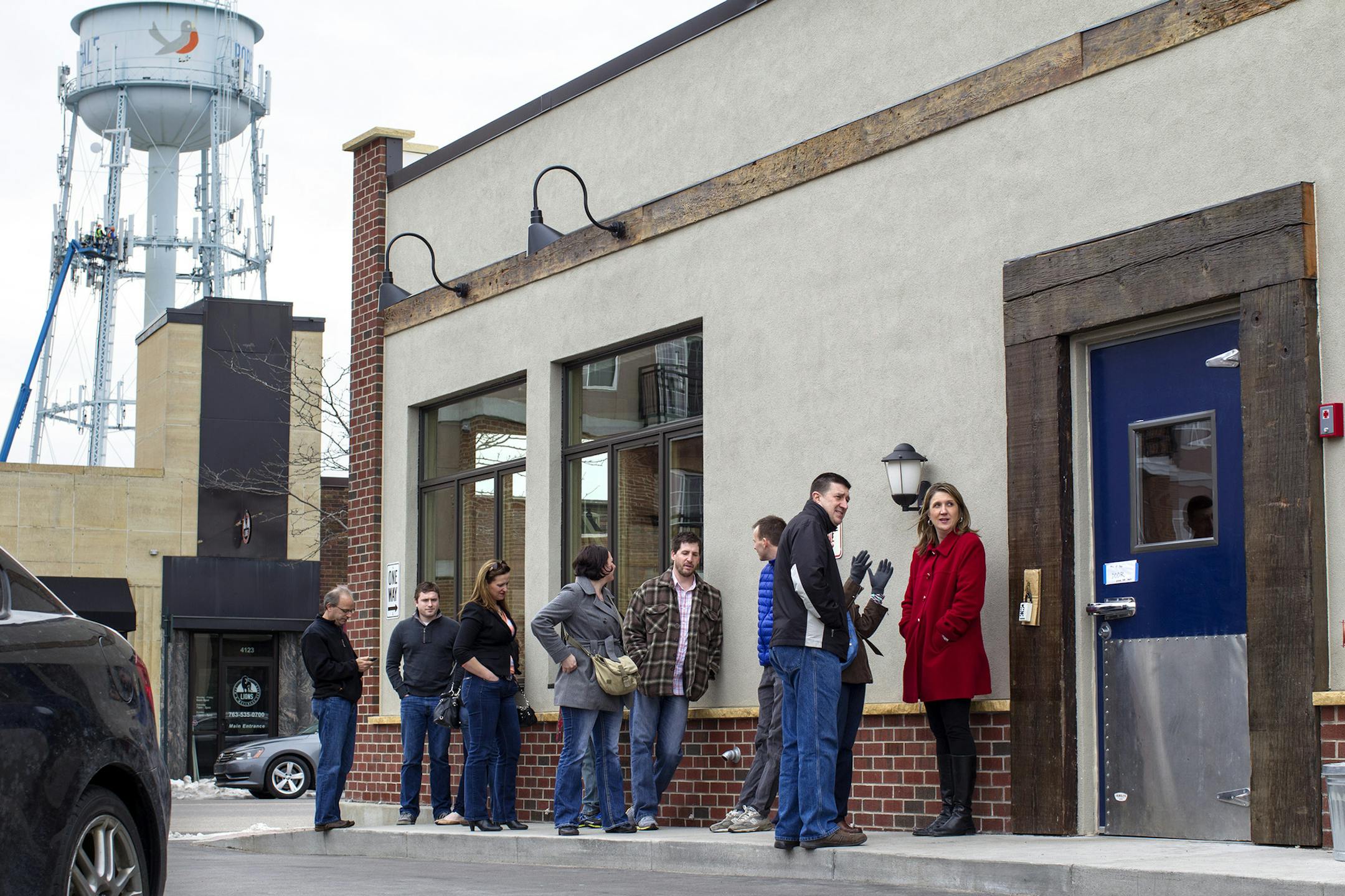 Guests line up for a Friday night 5pm opening at Travail and The Rookery in Robbinsdale April 18, 2014. (Courtney Perry/Special to the Star Tribune)