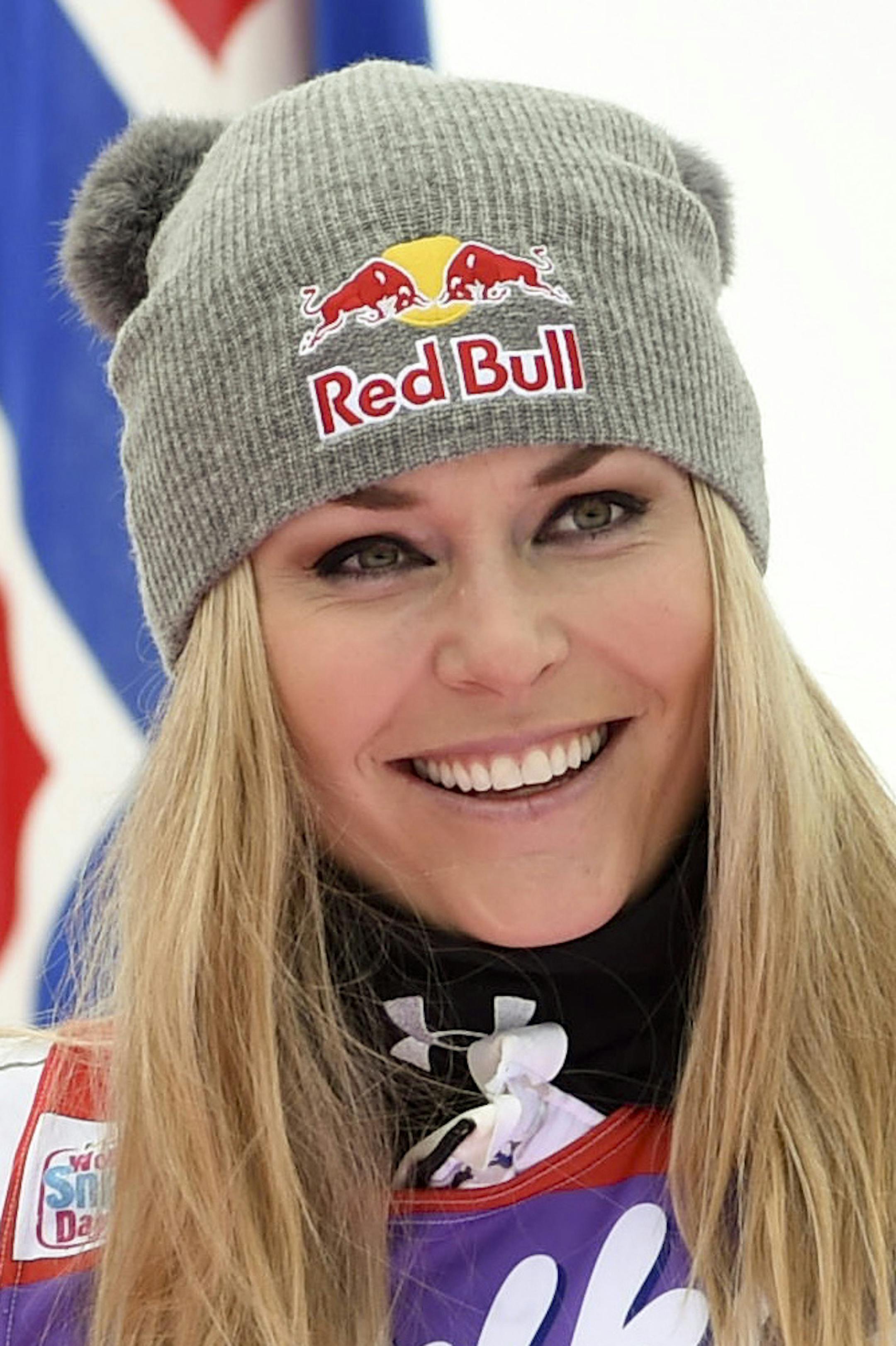 FILE - In this Jan. 9, 2016, file photo, Lindsey Vonn, of the United States, celebrates in the finish area after winning an alpine ski, women's World Cup downhill, in Altenmarkt-Zauchensee, Austria. Vonn underwent surgery to fix a broken right arm after a crash while training on the slopes in Copper Mountain, Colorado. The four-time overall World Cup champion said the wipeout happened Thursday, Nov. 10, 2016, and had surgery that night in Vail. (AP Photo/Pier Marco Tacca, File)