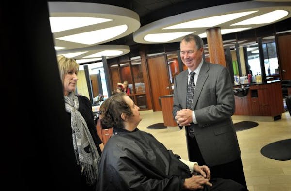 Doug Cole, founder of Cole's Salon, talked with stylist Janel Murphy and 30-year customer Marilyn Tubbs in the Apple Valley Coles Salon.