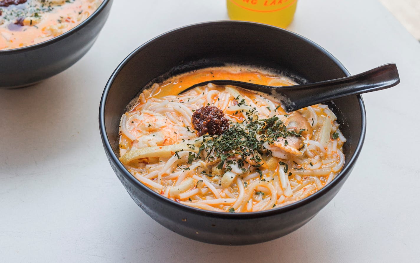 FILE Ñ A bowl of the noodle soup laksa, in Singapore, Sept. 6, 2018. In 2022, food forecasters see a new interest in mushrooms, a rethinking of chicken and coffee, a resurgence of 1980s cocktails Ñ and a return to civility among diners and shoppers. (Lauryn Ishak/The New York Times)